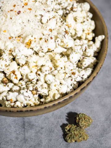 Herbed Weed Popcorn in a bowl with bud